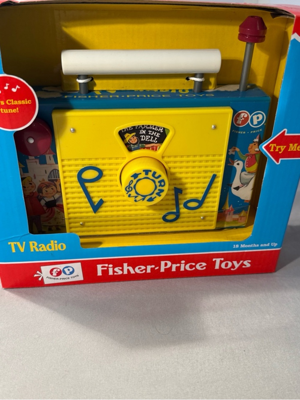 Mattel Fisher-Price Yellow and Blue TV Radio Toy with White Handle
